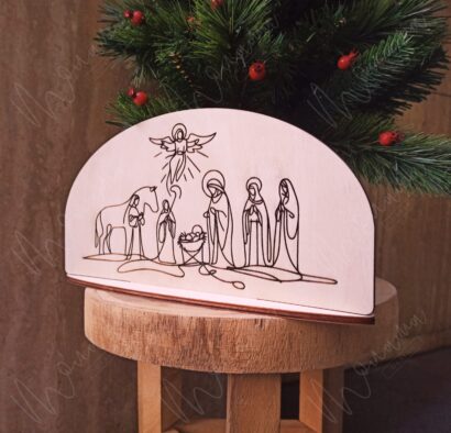 Drevený betlehem – minimalistická dekorácia s gravírovaným motívom narodenia Ježiša v štýle jednej línie, symbol viery a Vianoc.
